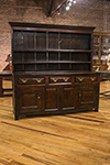 english sycamore dresser with raised open shelved back above three frieze drawers and cupboard doors
