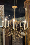 french art deco gilded eight arm chandelier with acanthus detail leaf