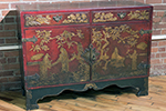english red lacquered commode with japanning on front, top and sides