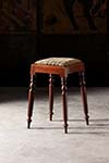english needlepoint stool with turned legs