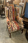 english georgian mahogany wing chair in kilim carpet
