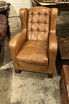 pair of cognac colour leather armchairs by guglielmo ulrich, a famous italian architect