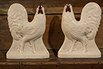 a pair of staffordshire pottery cockerels with red comb and wattles