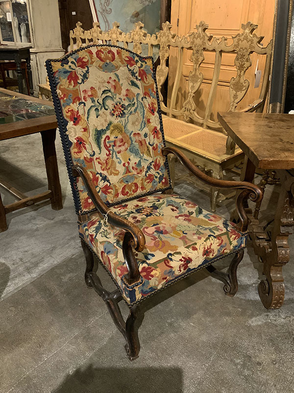 Beautiful English Needlepoint Armchair with Curved Arms, Nail Head Trim and Scrolled Legs and Stretchers