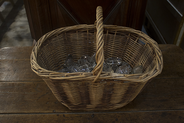 ENGLISH WICKER BASKET WITH CRYSTAL DECANTER STOPPERS