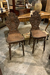 pair of carved oak hall chairs with porcupine carvings from holland