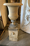 english buff terracotta urn on lion mask pedestal