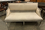 painted swedish sofa with detailed carving on frame