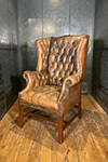 large scale english button leather wing chair with nailhead trim